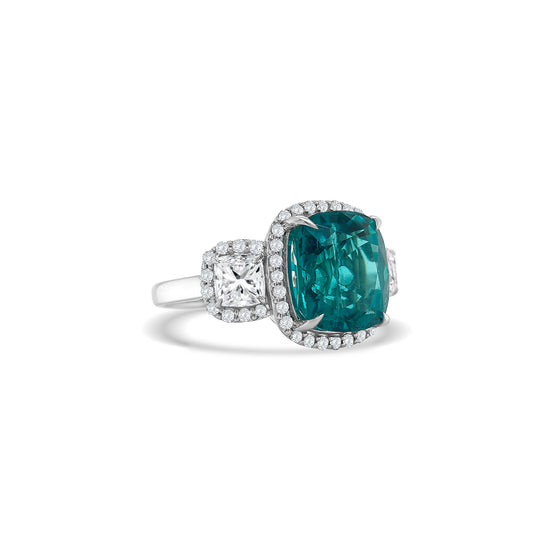 "Paraiba Tourmaline & Diamond Trilogy Halo Ring," "Tourmaline and Diamond Ring," "Fine Jewelry," "Luxury Ring," "Fashion Ring," "Gemstone Jewelry," "Sparkling Halo Ring," "Statement Ring," "Elegant Jewelry," "Special Occasion Ring," "Paraiba Tourmaline Ring," "Timeless Jewelry," "Handcrafted Ring," "Unique Gemstone Ring," "Classic Halo Ring."