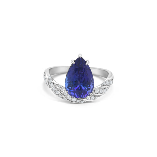 Pear Shape Tanzanite & Diamond Ring, Tanzanite Ring, Diamond Ring, Pear Shape Gemstone, Tanzanite Jewelry, Diamond Jewelry, Pear Shape Ring, Tanzanite and Diamond Design, Elegant Tanzanite Ring, Fine Jewelry Ring.