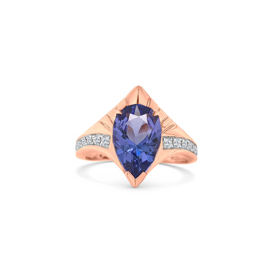 "Pear Shaped Tanzanite Ring, Tanzanite and Diamond Ring, Pear Cut Tanzanite Jewelry, Blue Gemstone Ring, Pear Shaped Engagement Ring, Tanzanite Ring with Diamonds, Pear Shaped Blue Stone Ring, Elegant Tanzanite Diamond Ring, Pear Shaped Tanzanite and Diamond Ring."