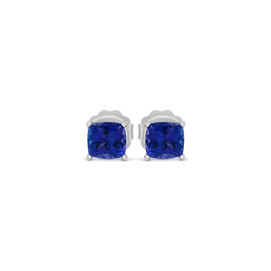 "Cushion Cut Tanzanite Stud Earrings," "Tanzanite Stud Earrings," "Fine Jewelry," "Luxury Earrings," "Fashion Earrings," "Gemstone Jewelry," "Sparkling Tanzanite Earrings," "Statement Earrings," "Elegant Jewelry," "Special Occasion Earrings," "Cushion Cut Earrings," "Tanzanite Jewelry," "Timeless Jewelry," "Handcrafted Earrings," "Unique Gemstone Studs."