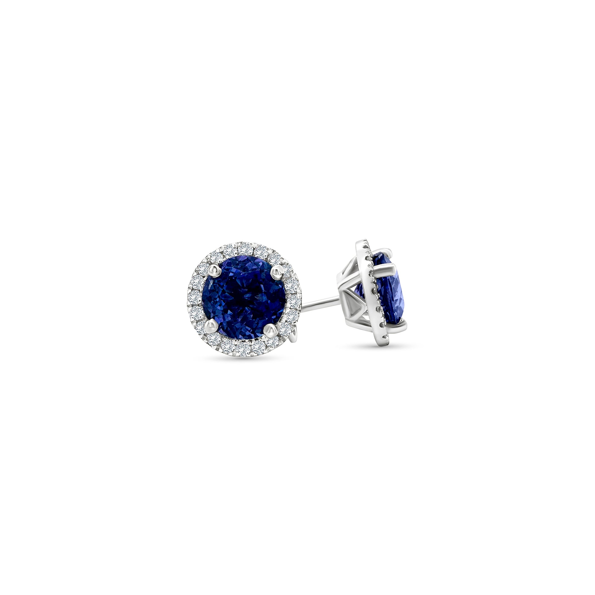 Round Tanzanite & Diamond Halo Stud Earrings" Tanzanite Detail: "Vibrant Round Tanzanite Gemstone" Diamond Halo: "Halo of Diamonds Surrounding Tanzanite" Earring Set: "Elegant Set of Tanzanite & Diamond Stud Earrings" Liner Options: "Earrings with Different Open Liners for Customization" Radiant Beauty: "Sparkling Tanzanite & Diamond Halo Stud Earrings"