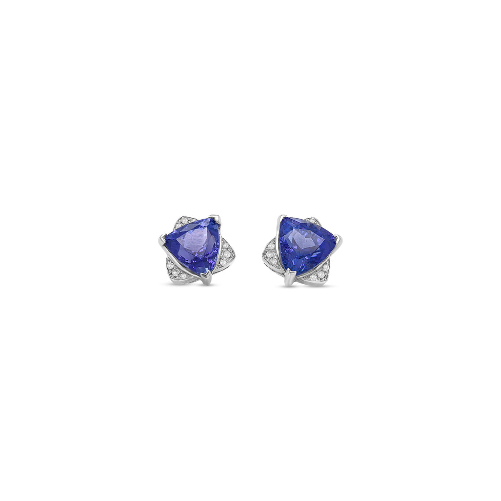 These stunning trillion cut tanzanite and diamond stud earrings are a perfect blend of vibrant color and timeless elegance. Featuring brilliant trillion-shaped tanzanite gemstones, each framed by sparkling diamond accents, these earrings exude sophistication and charm. The unique trillion cut enhances the tanzanite's vivid blue-violet hues, while the diamonds add a touch of radiant brilliance. Perfect for adding a pop of color to any outfit or as a thoughtful gift, these earrings are a dazzling expression o