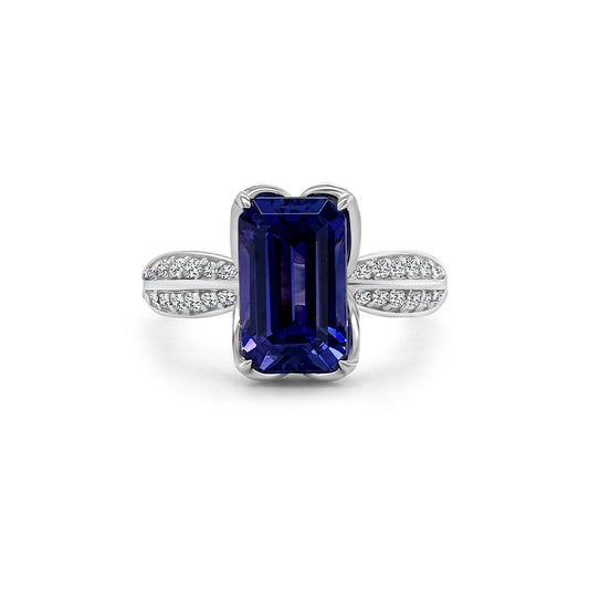 "Emerald Cut Tanzanite & Diamond Ring," "Exquisite Emerald Cut Tanzanite Engagement Ring," "Luxurious Tanzanite and Diamond Ring with Emerald Cut," "Elegant Emerald Cut Tanzanite Diamond Ring," "Fine Jewelry Emerald Cut Tanzanite with Diamonds," "High-Quality Tanzanite Emerald Cut Diamond Ring," "Statement Emerald Cut Tanzanite and Diamond Band," "Sparkling Emerald Cut Tanzanite and Diamond Ring," "Beautiful Emerald Cut Tanzanite Wedding Ring," "Fashionable Tanzanite Diamond Ring with Emerald Cut."