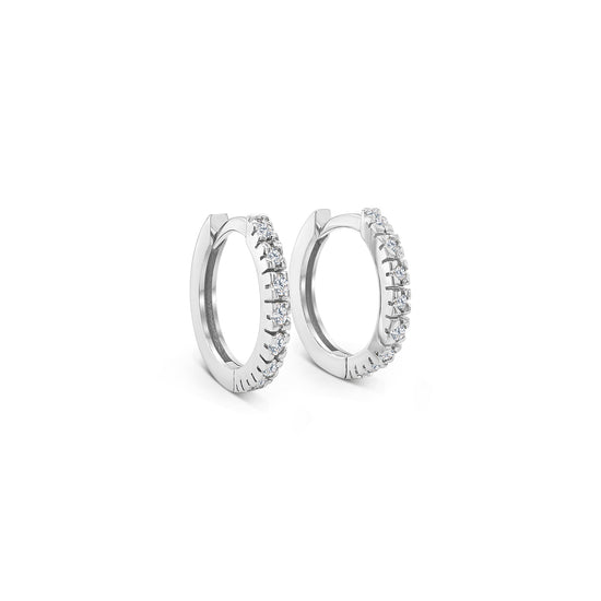 "Round Brilliant Diamond Earrings," "Huggy Earrings," "Diamond Stud Earrings," "Small Diamond Hoops," "Classic Diamond Jewelry," "Everyday Diamond Earrings," "Diamond Huggie Hoops," "Timeless Diamond Accessories."
