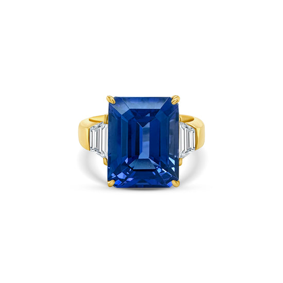 "Emerald Cut Tanzanite & Diamond Ring," "Exquisite Emerald Cut Tanzanite Ring," "Luxurious Diamond and Tanzanite Jewelry," "Elegant Emerald Cut Gemstone Ring," "Fine Jewelry with Emerald Cut Tanzanite and Diamonds," "High-Quality Emerald Cut Tanzanite Ring," "Statement Emerald Cut Gemstone and Diamond Ring," "Sparkling Tanzanite and Diamond Jewelry," "Beautiful Emerald Cut Gemstone Ring," "Fashionable Tanzanite & Diamond Ring."