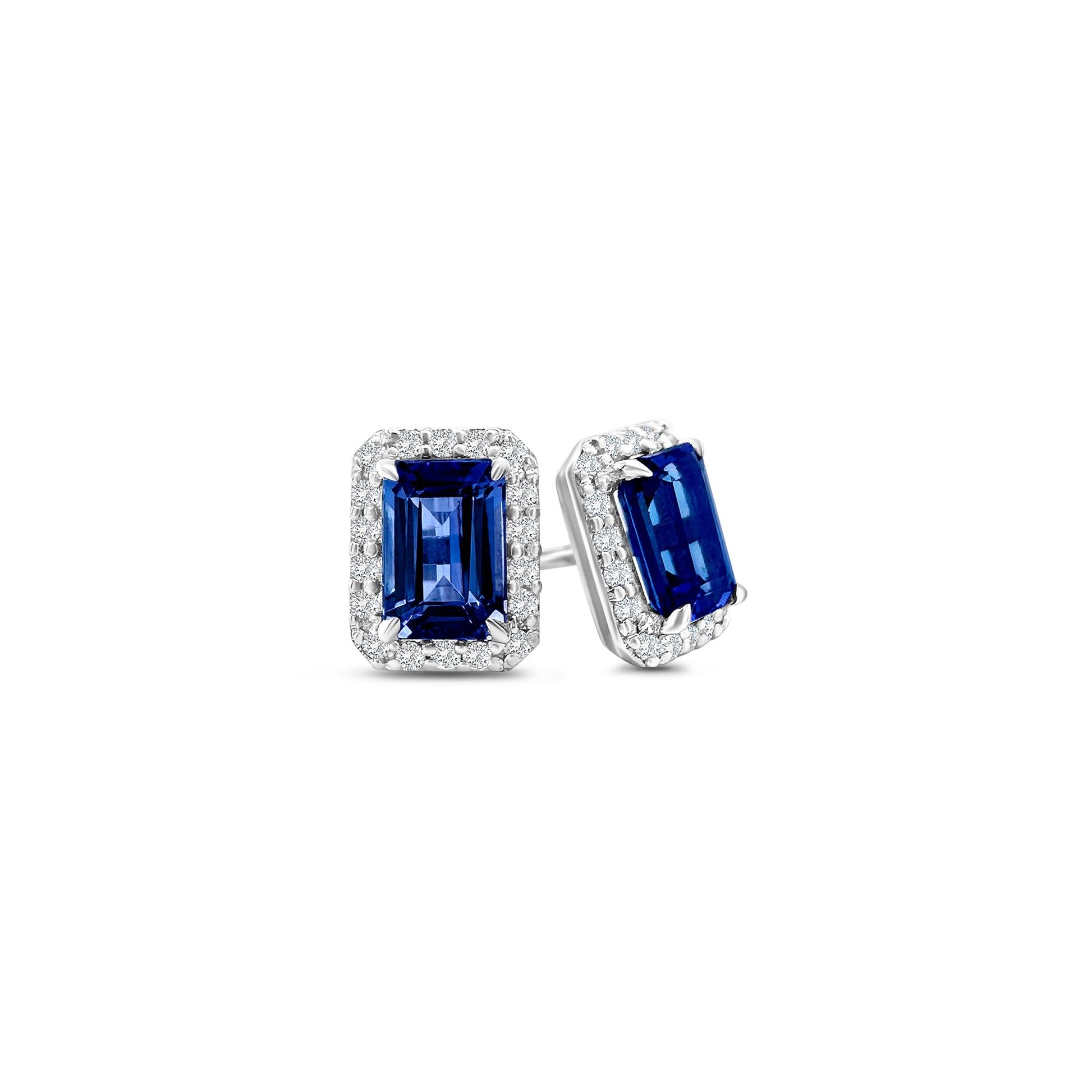 "Emerald Cut Tanzanite & Diamond Halo Stud Earrings," "Tanzanite and Diamond Stud Earrings," "Halo Stud Earrings," "Fine Jewelry," "Luxury Earrings," "Fashion Earrings," "Gemstone Jewelry," "Sparkling Tanzanite Earrings," "Statement Earrings," "Elegant Jewelry," "Special Occasion Earrings," "Tanzanite Jewelry," "Timeless Jewelry," "Handcrafted Earrings," "Unique Gemstone Studs."