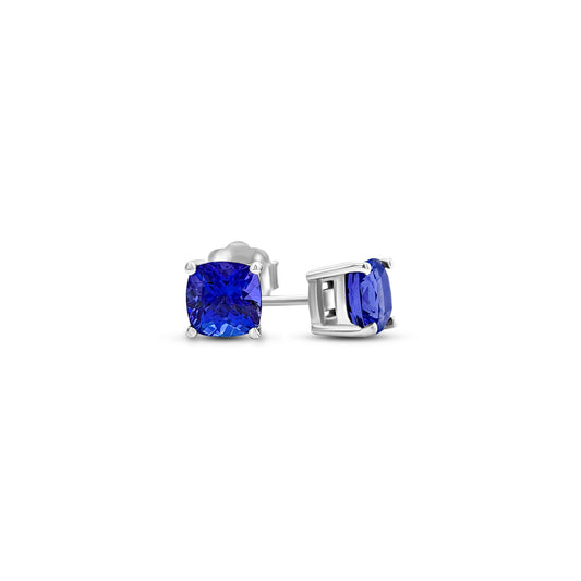 "Cushion Cut Tanzanite Stud Earrings," "Tanzanite Stud Earrings," "Fine Jewelry," "Luxury Earrings," "Fashion Earrings," "Gemstone Jewelry," "Sparkling Tanzanite Earrings," "Statement Earrings," "Elegant Jewelry," "Special Occasion Earrings," "Cushion Cut Earrings," "Tanzanite Jewelry," "Timeless Jewelry," "Handcrafted Earrings," "Unique Gemstone Studs."