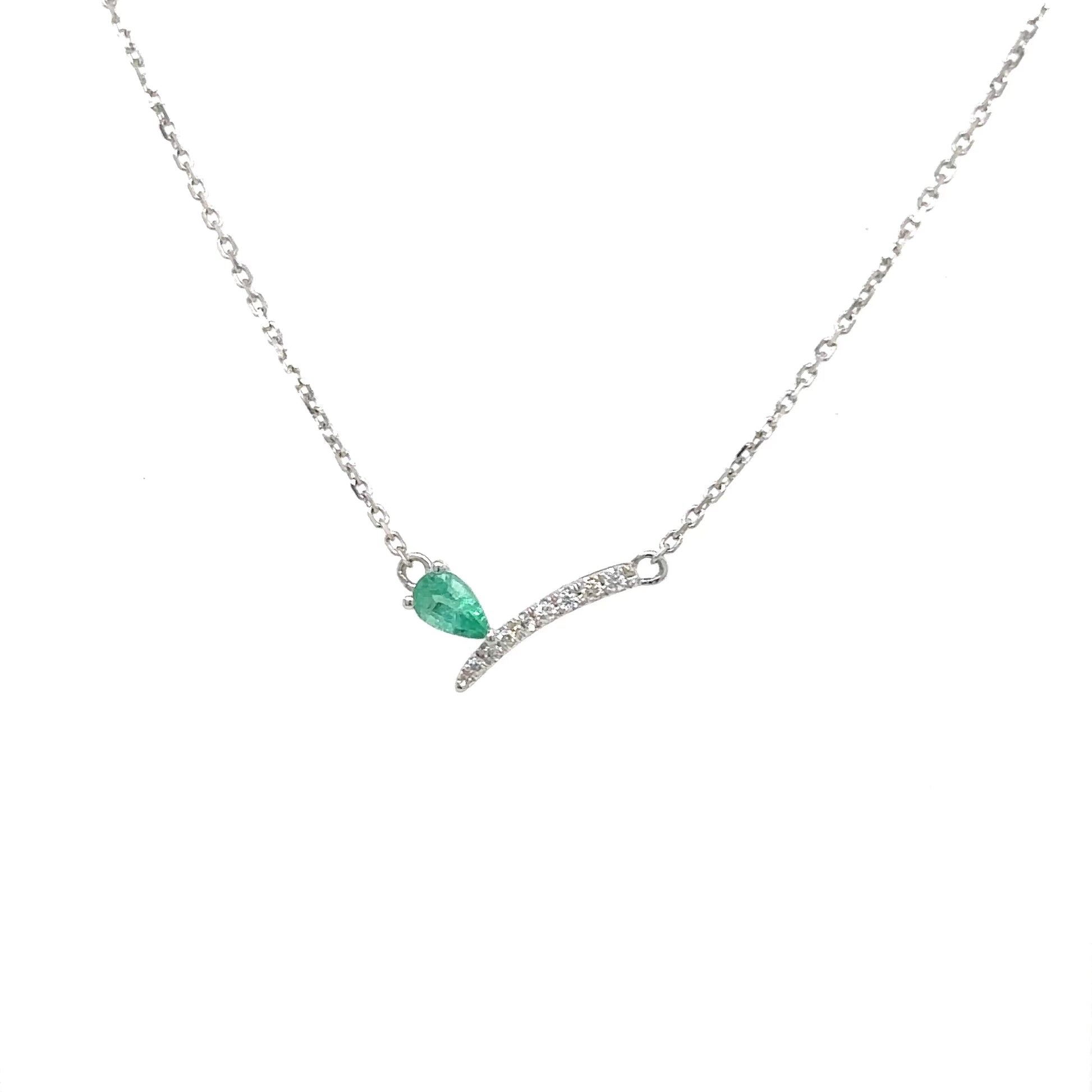 "Pear Shape Emerald Necklace, Emerald and Diamond Necklace, Pear Shape Diamond Necklace, Emerald Necklace with Diamonds, Pear Cut Emerald Pendant, Diamond and Emerald Necklace, Fine Jewelry Necklace, Luxury Emerald and Diamond Necklace, Elegant Emerald Necklace, Pear Shape Gemstone Necklace."