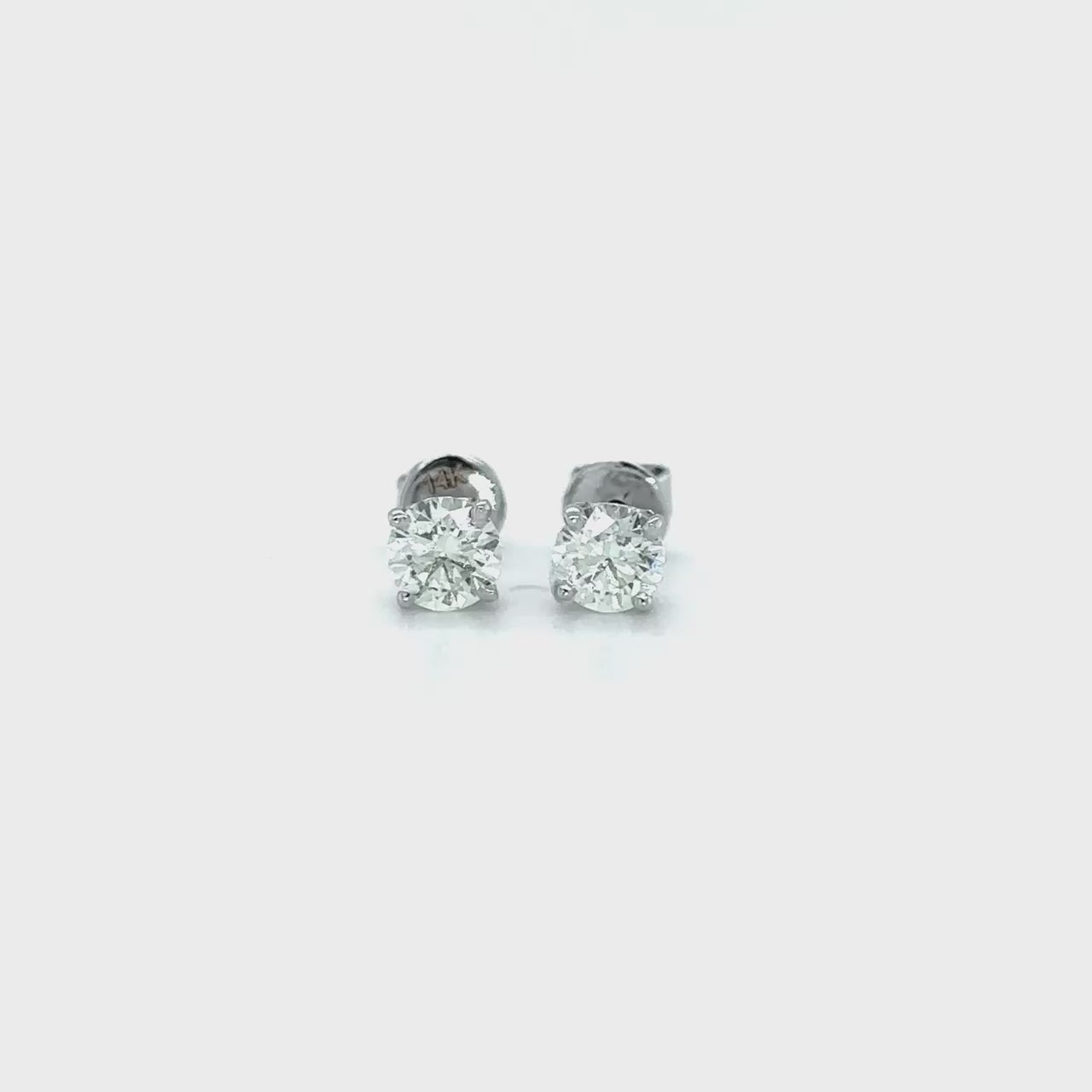 "Round Brilliant Diamond Stud Earrings, Sparkling Round Diamond Stud Earrings, Elegant Round Diamond Stud Earrings, Classic Round Diamond Stud Earrings, Timeless Round Diamond Stud Earrings, High-Quality Round Diamond Stud Earrings, Brilliant Cut Diamond Stud Earrings, Round Cut Diamond Stud Earrings, Stunning Diamond Stud Earrings, Luxurious Diamond Stud Earrings, Women's Round Diamond Stud Earrings, Men's Round Diamond Stud Earrings, Genuine Round Diamond Stud Earrings,