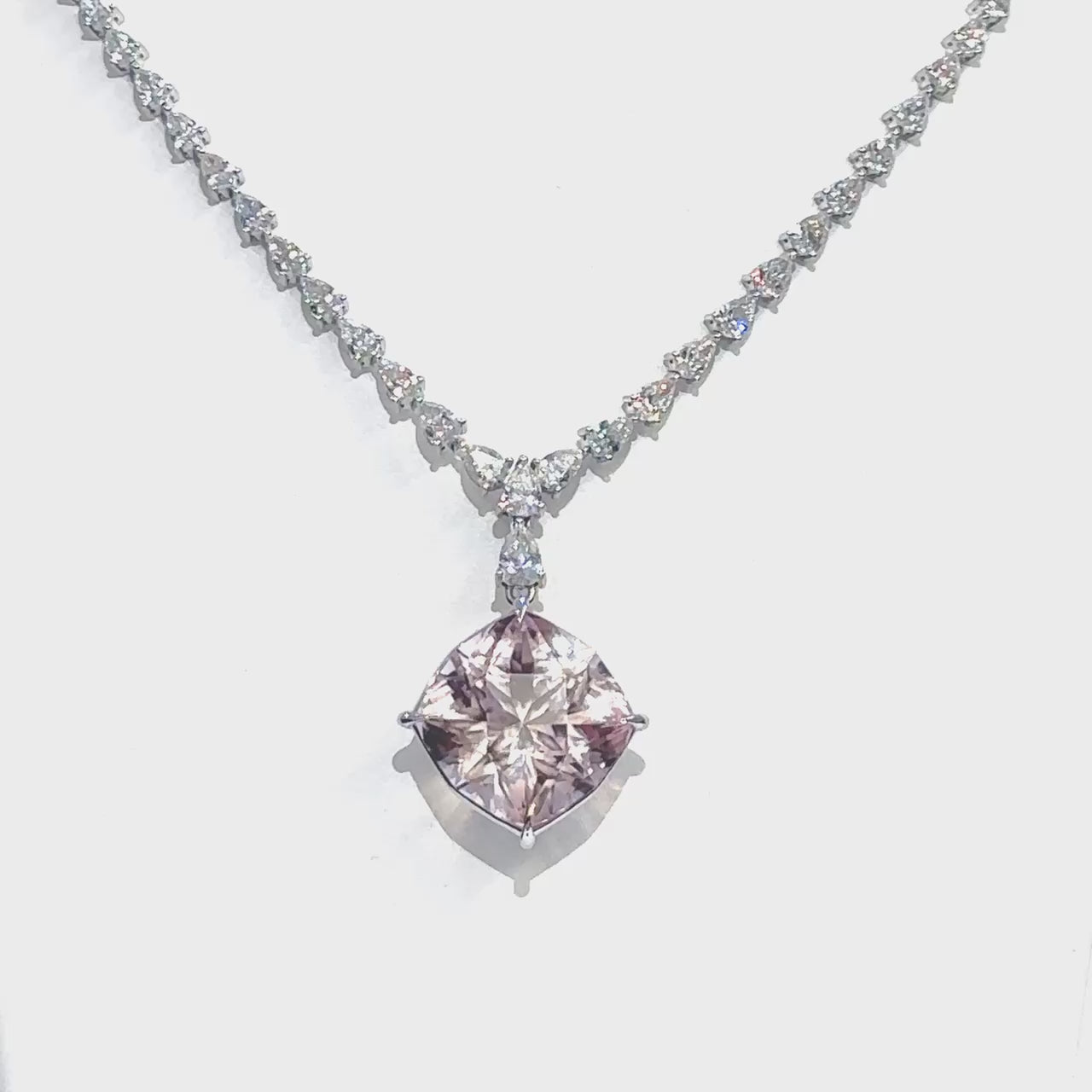 "Kunzite & Diamond Necklace," "Kunzite Necklace," "Diamond Jewelry," "Fine Jewelry," "Luxury Necklace," "Fashion Necklace," "Gemstone Jewelry," "Sparkling Necklace," "Statement Necklace," "Elegant Jewelry," "Special Occasion Necklace," "Kunzite and Diamond Necklace," "Timeless Jewelry," "Handcrafted Necklace," "Unique Gemstone Necklace."