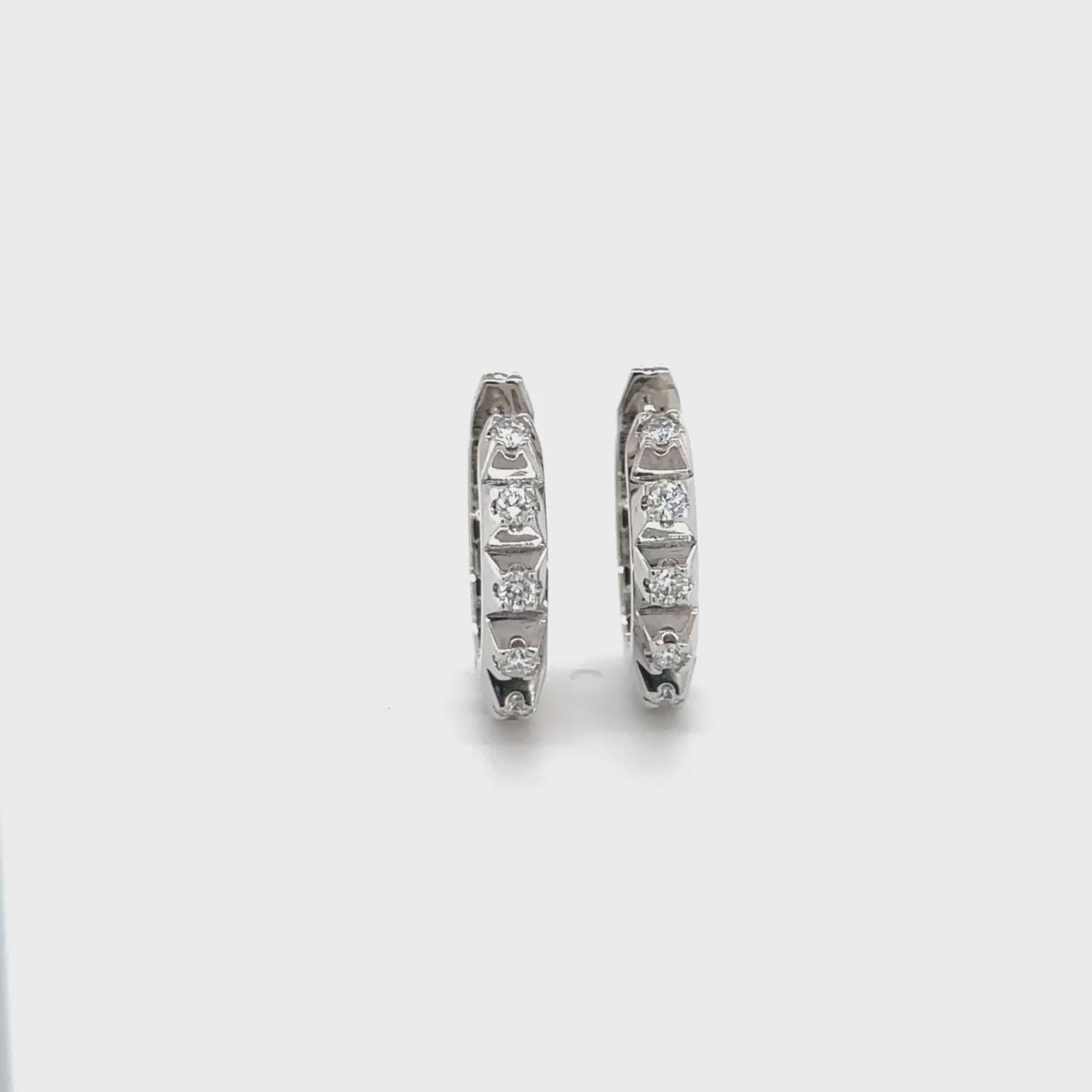 "Round Brilliant Diamond Huggy Earrings, Sparkling Diamond Huggies, Elegant Diamond Hoops, Classic Diamond Stud Earrings, Timeless Diamond Huggy Style, Glamorous Diamond Huggy Earrings, Stunning Round Diamond Earrings, Chic Diamond Huggy Hoops."