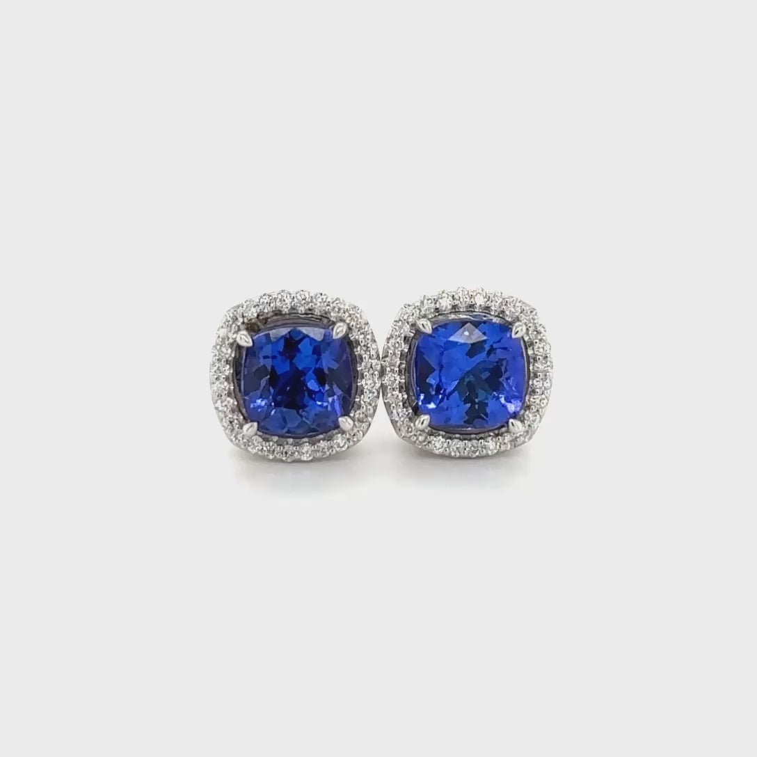 Cushion Tanzanite Earrings, Diamond Halo Earrings, Stud Earrings, Gemstone Earrings, Precious Stone Earrings, Elegant Jewelry, Blue Gemstone Earrings, Halo Design Earrings, Sparkling Diamond Earrings, Luxury Studs."