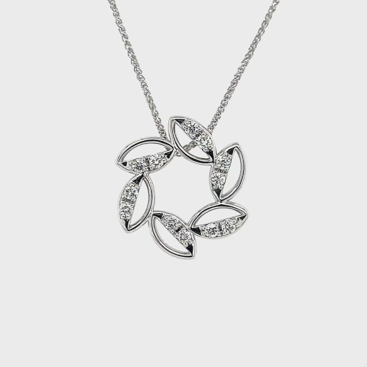 "sparkling diamond pendant, elegant jewelry, timeless accessory, exquisite round pendant, radiant brilliance, luxurious necklace, dazzling centerpiece, stunning fine jewelry, classic beauty, glamorous adornment."