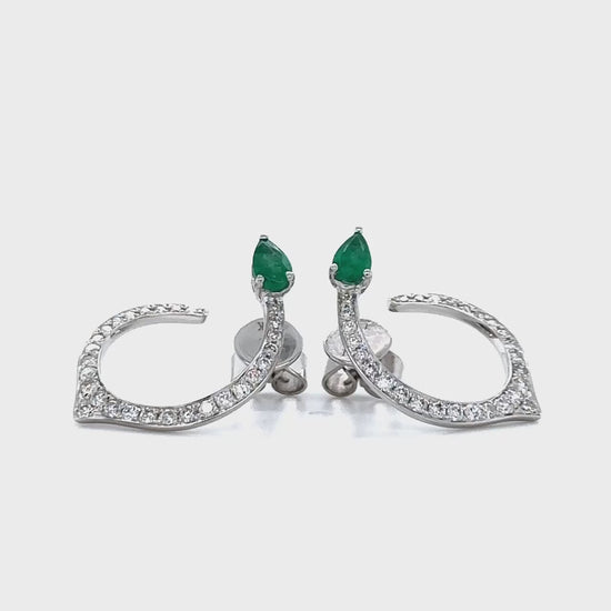 pear shape emerald earrings, diamond dangle earrings, emerald and diamond jewelry, pear cut emerald earrings, luxury emerald earrings, gemstone dangle earrings, elegant pear shape earrings, emerald and diamond dangle earrings, fine jewelry earrings, pear shape emerald drop earrings.