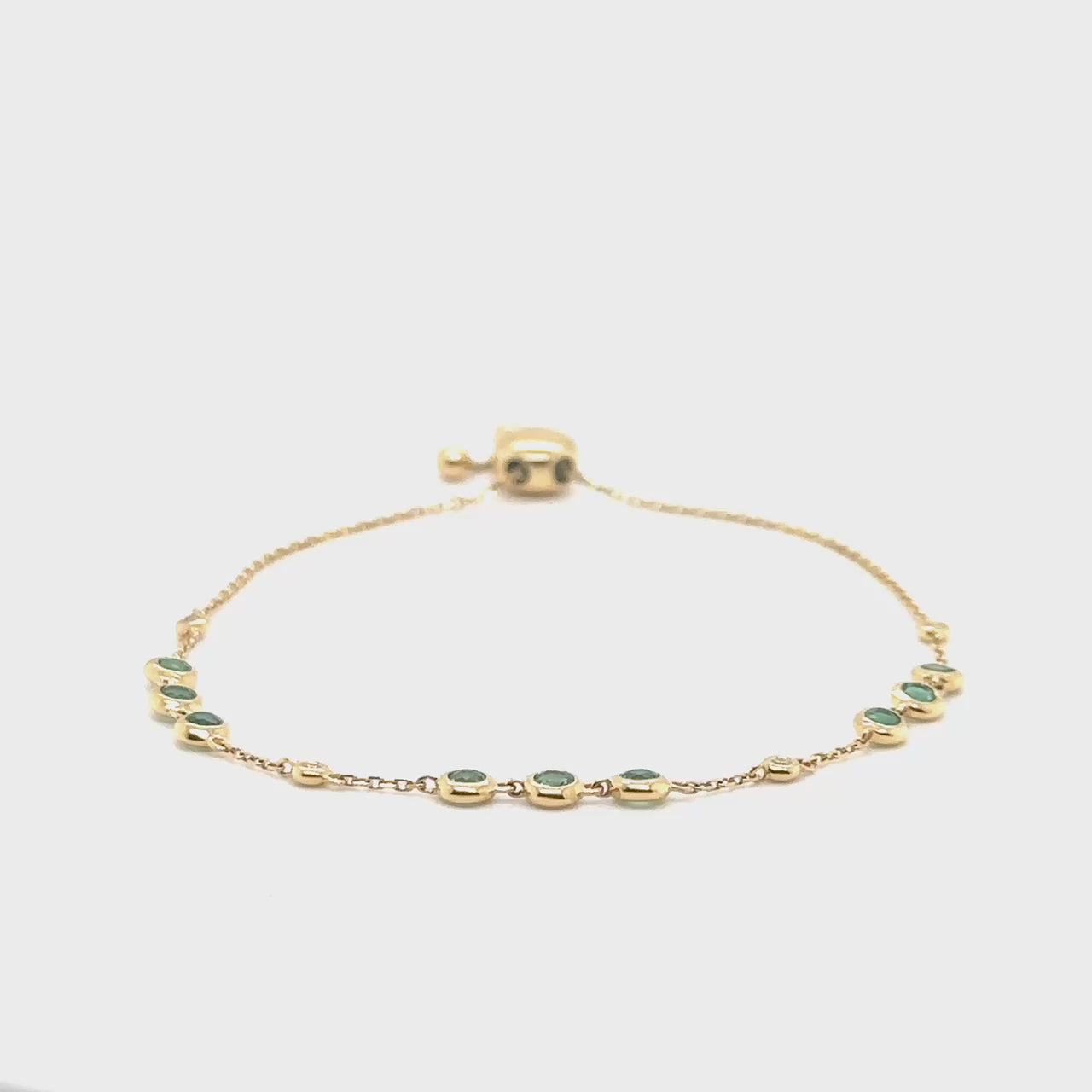 A luxurious, round emerald and diamond bracelet, showcasing exquisite craftsmanship, elegant emeralds glistening alongside brilliant diamonds, a timeless accessory capturing sophistication and grace.