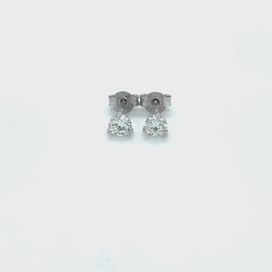 Classic diamond stud earrings," "Timeless round cut diamond earrings," "Elegant round brilliant diamond studs," "Luxurious round diamond stud earrings," "Stunning round brilliant diamond studs," "Chic diamond stud earrings," "Gorgeous round cut diamond studs," "Exquisite round brilliant diamond earrings," "Beautiful round diamond stud earrings.