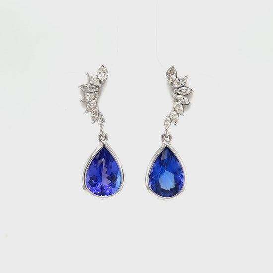 "Pear Shape Tanzanite Earrings, Diamond Drop Earrings, Tanzanite and Diamond Earrings, Elegant Drop Earrings, Pear Cut Tanzanite Jewelry, Luxurious Gemstone Earrings, Fine Jewelry Tanzanite Earrings."