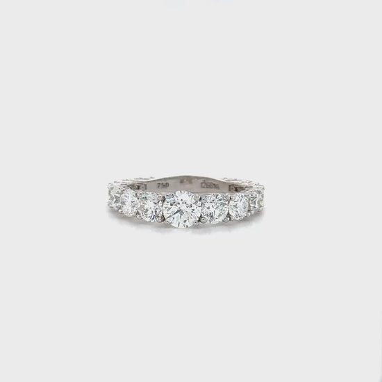 Round diamond ring, Brilliant cut, Half eternity band, Diamond jewelry, Sparkling gemstones, Luxurious accessory, Fine jewelry piece, Elegant design, Statement ring, Classic beauty