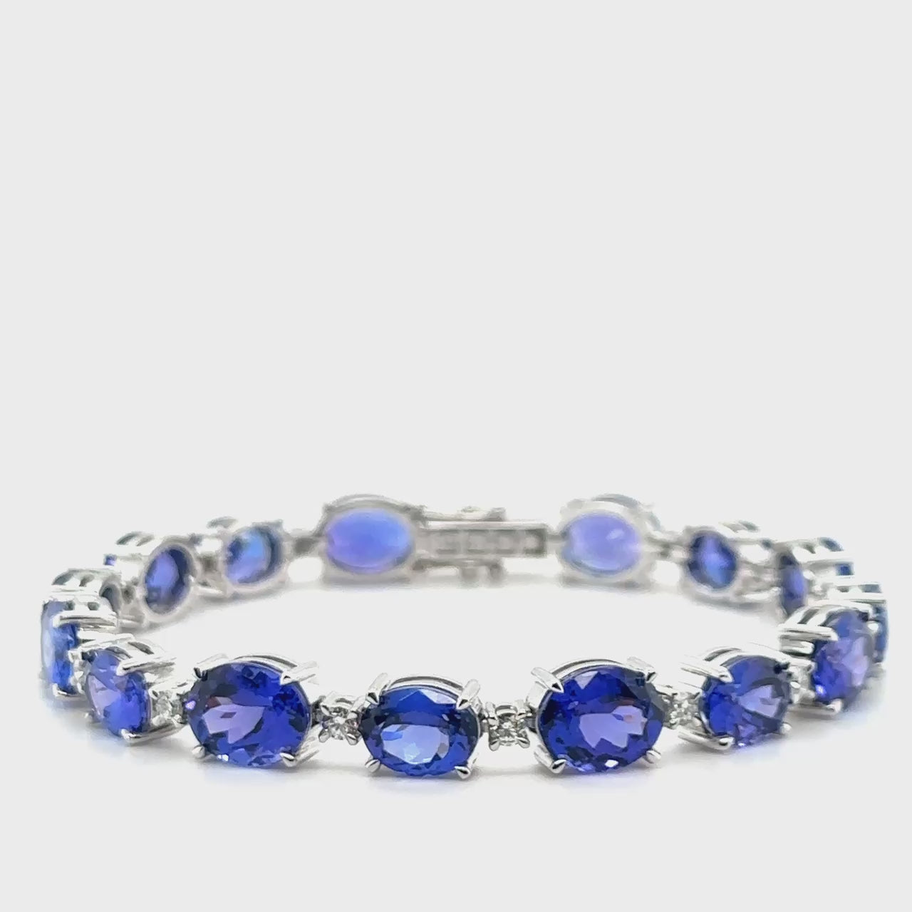  Oval Tanzanite & Diamond Bracelet, Tanzanite Bracelet, Diamond Bracelet, Oval Tanzanite Jewelry, Tanzanite and Diamond Bracelet, Gemstone Bracelet, Elegant Tanzanite Bracelet, Tanzanite Bracelet for Women, Fine Jewelry Bracelet, Luxury Tanzanite Bracelet, Tanzanite Gemstone Bracelet, Oval Tanzanite Gemstone, Tanzanite and Diamond Jewelry, Women's Tanzanite Bracelet, Tanzanite Bracelet with Diamonds.