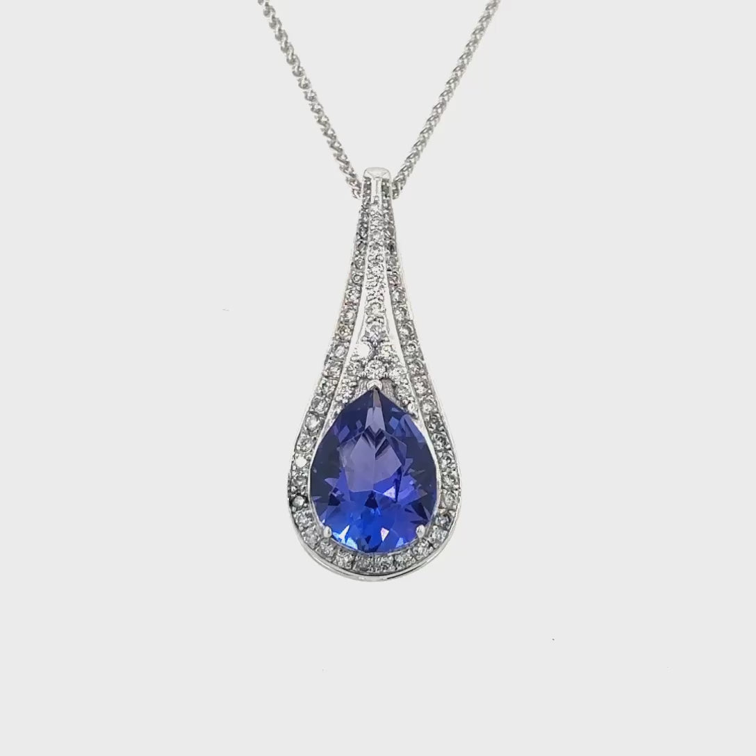 Oval Tanzanite Pendant, Tanzanite Jewelry, Diamond Accents, Tanzanite Necklace, Gemstone Pendant, Fine Jewelry, Oval Pendant, Diamond and Tanzanite Pendant, Luxury Necklace, Elegant Jewelry