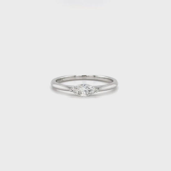 Marquise Solitaire Diamond Ring: elegant engagement ring, single stone diamond band, classic solitaire design, luxurious bridal jewelry, timeless engagement piece