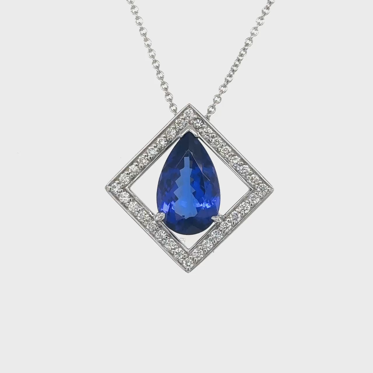 Pear Shape Tanzanite Pendant, Tanzanite & Diamond Pendant, Pear Shape Tanzanite Jewelry, Elegant Tanzanite Necklace, Pear Shaped Gemstone Pendant, Blue Tanzanite Pendant, Diamond and Tanzanite Pendant.