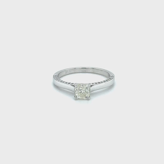 "A stunning cushion-cut diamond ring," "a luxurious solitaire engagement ring," "a sparkling diamond ring for special occasions," "an elegant cushion-cut solitaire ring," "a timeless diamond ring design," "a classic cushion-cut diamond engagement ring."