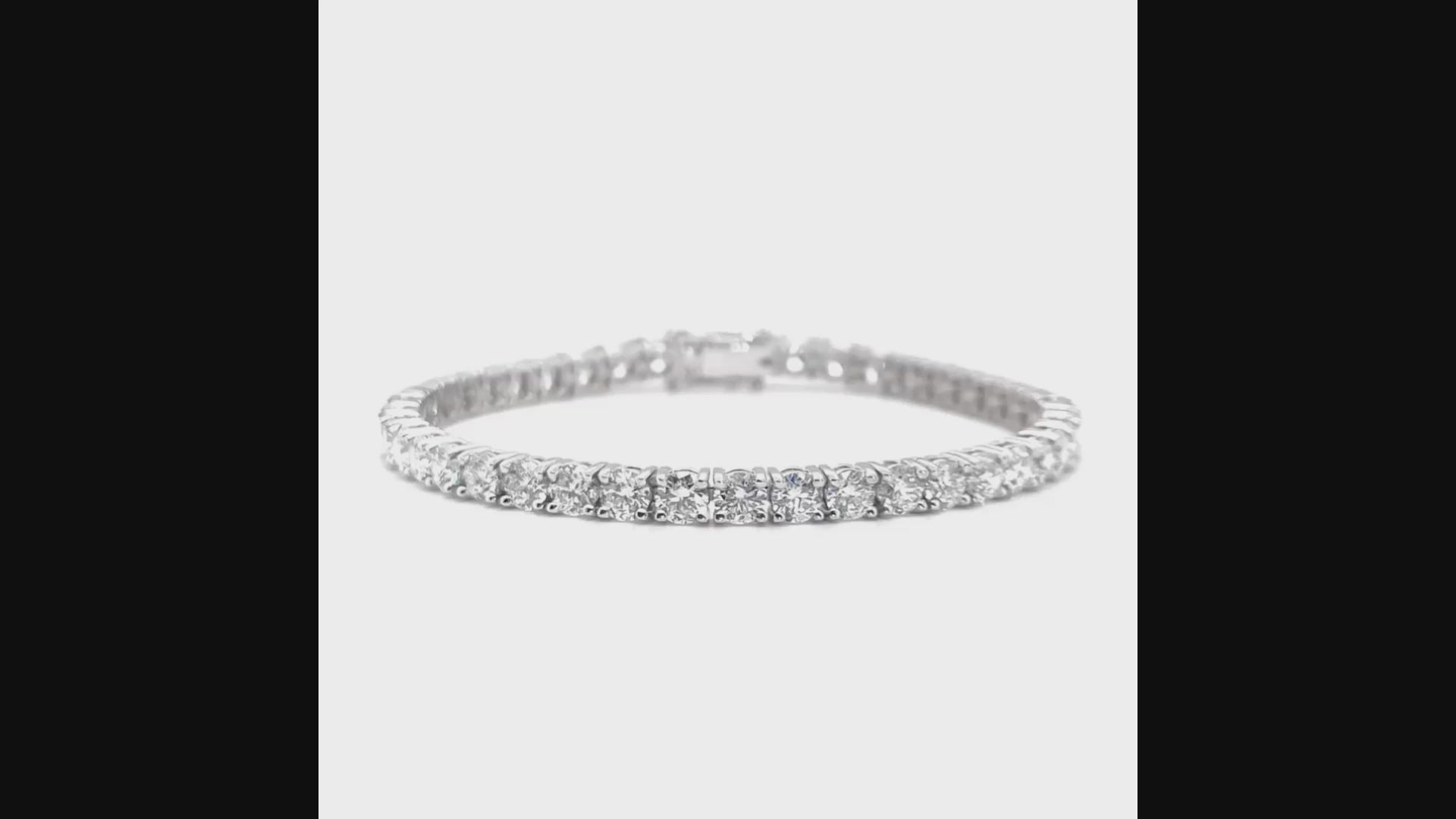 A stunning diamond tennis bracelet, featuring brilliant diamonds, perfect for any occasion, adding elegance and glamour to your look, a timeless accessory, sparkling with every movement, exuding sophistication and luxury, a must-have piece for every jewelry collection.