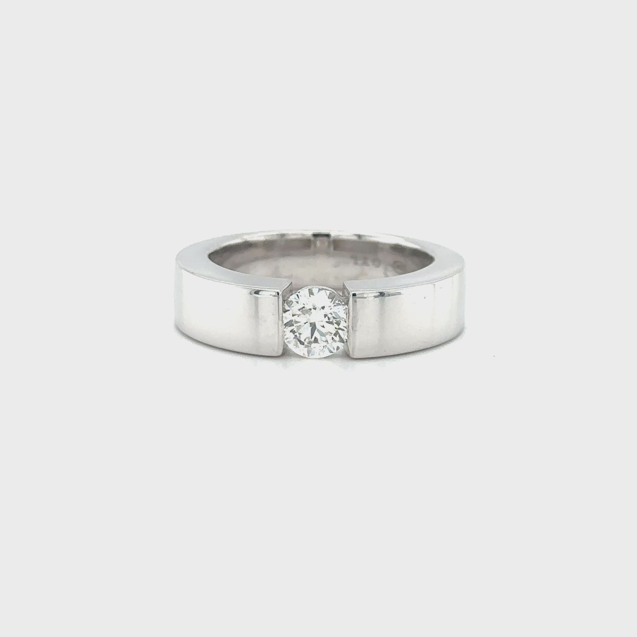 "White Gold Diamond Band," "Exquisite White Gold Diamond Wedding Band," "Luxurious Diamond Band in White Gold," "Elegant White Gold Diamond Ring," "Fine Jewelry White Gold Band with Diamonds," "High-Quality Diamond Wedding Band in White Gold," "Statement White Gold Diamond Band," "Sparkling Diamond Band in White Gold," "Beautiful White Gold Diamond Ring," "Fashionable Diamond Band in White Gold."