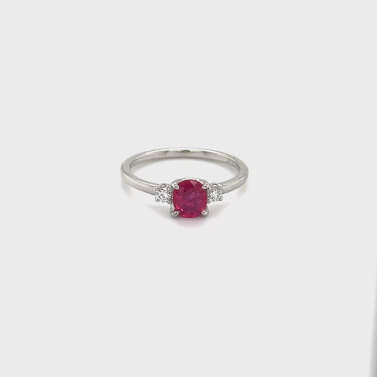 "pear shape ruby ring, diamond ring, gemstone jewelry, red gemstone ring, luxury jewelry, statement ring, precious stone ring, anniversary gift, engagement ring, fine jewelry, unique design, cocktail ring, pear cut gemstone, elegant accessory"