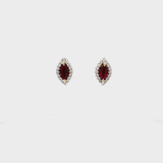 Marquise Ruby and Diamond Stud Earrings Close-Up Elegant Marquise Cut Ruby Earrings Precious Gemstone and Diamond Studs Luxury Marquise Ruby and Diamond Jewelry Exquisite 1.00ct Ruby Stud Earrings Brilliant Red Ruby and Diamond Accents Fine Gemstone and Diamond Combination Marquise Shaped Ruby and Diamond Earrings Captivating Ruby and Diamond Earrings Statement Marquise Earrings with Diamonds