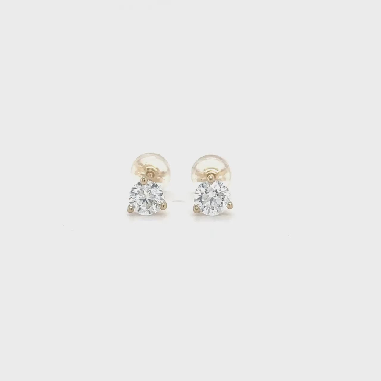 "Round Brilliant Diamond Stud Earrings", alt="Diamond Stud Earrings", alt="Round Diamond Earrings", alt="Brilliant Cut Diamond Studs", alt="Classic Diamond Earrings", alt="Luxury Diamond Studs", alt="Elegant Diamond Stud Earrings", alt="Timeless Round Diamond Earrings", alt="High-Quality Diamond Studs", alt="Sparkling Diamond Stud Earrings"