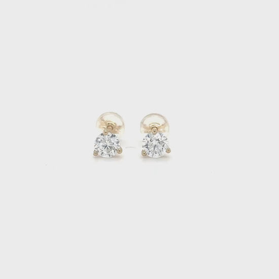 "Round Brilliant Diamond Stud Earrings", alt="Diamond Stud Earrings", alt="Round Diamond Earrings", alt="Brilliant Cut Diamond Studs", alt="Classic Diamond Earrings", alt="Luxury Diamond Studs", alt="Elegant Diamond Stud Earrings", alt="Timeless Round Diamond Earrings", alt="High-Quality Diamond Studs", alt="Sparkling Diamond Stud Earrings"