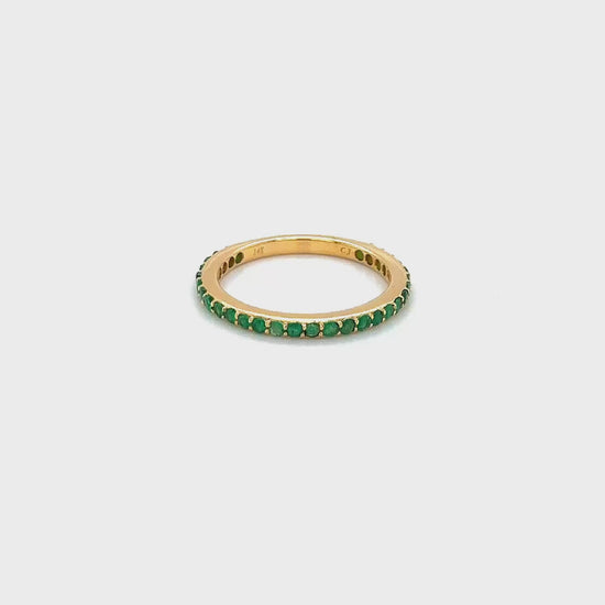 "Round Emerald Eternity Ring, Stunning Green Gemstone Ring, Sparkling Eternity Band, Elegant Jewelry, Luxurious Accessories, Precious Emerald Stones, Timeless Fashion Piece, Exquisite Gemstone Ring, Dazzling Eternity Design, Fashionable Statement Piece"