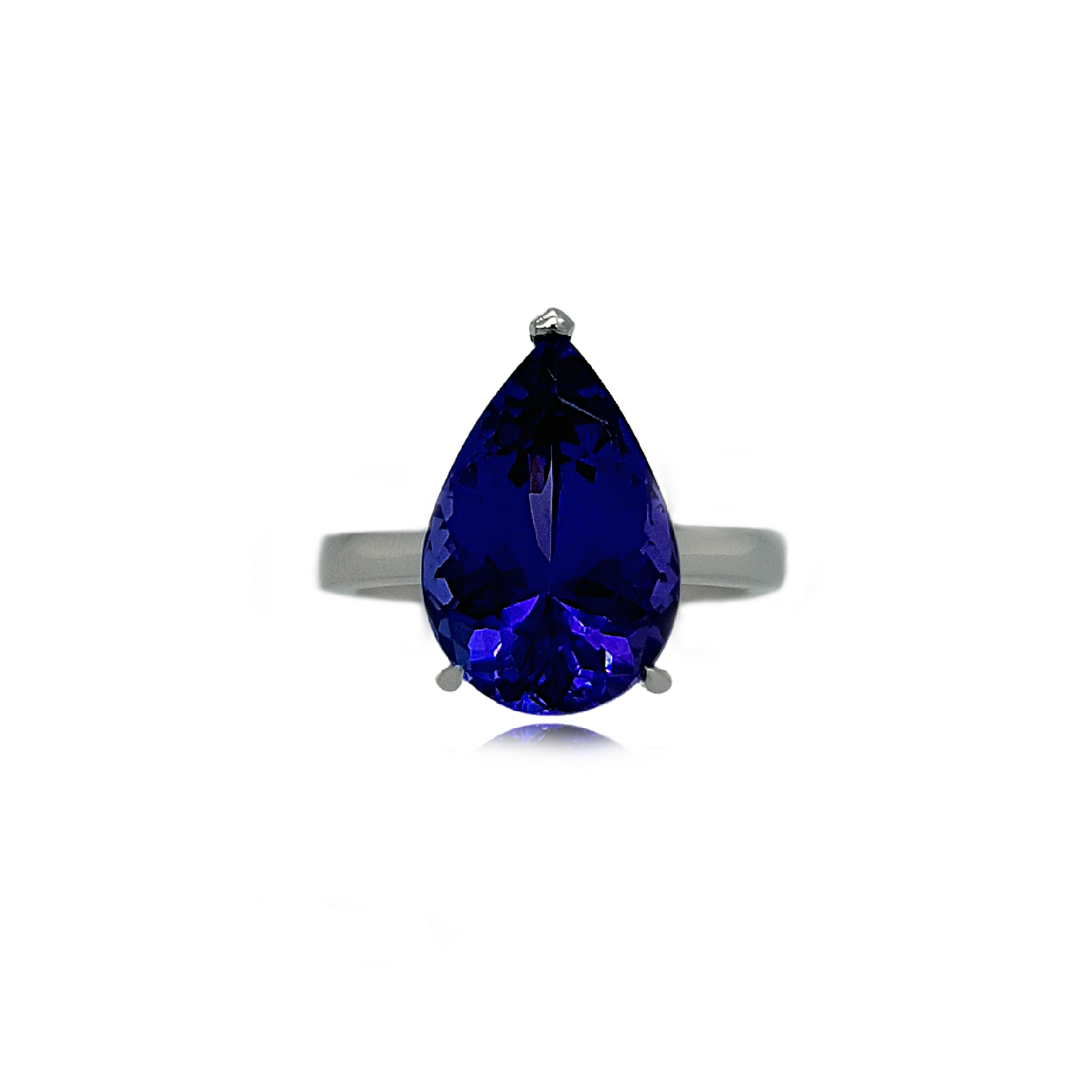 "Pear-shaped Tanzanite Engagement Ring in Solitaire Setting" "Elegant Tanzanite Ring with Pear-cut Gemstone" "Classic Pear Tanzanite Solitaire Ring" "Exquisite Pear Tanzanite Engagement Ring" "Simple and Stunning Tanzanite Solitaire in Pear Shape" "Single Stone Pear Tanzanite Ring" "Timeless Pear-Cut Tanzanite Engagement Ring"