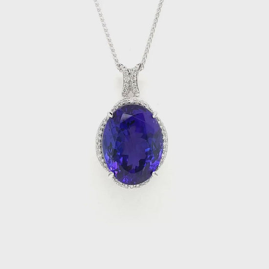  Sure, here are some tags for the Oval Halo Tanzanite Pendant: Tanzanite Jewelry, Oval Pendant, Halo Design, Gemstone Necklace, Elegant Jewelry, Sterling Silver, Precious Stones, Fashion Accessories, Statement Piece, Gift for Her.