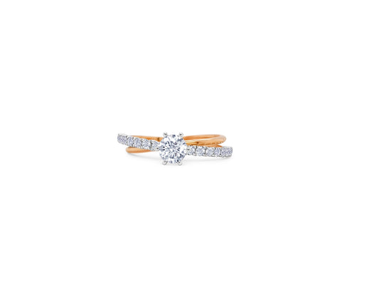 0.70ct Round Brilliant Cut Diamond Ring This exceptional diamond ring sets the bar by combining white gold and rose gold setting filled round brilliant cut diamonds and an ultra-chic fashionable piece that will be adored by many.  18k Rose gold & White gold