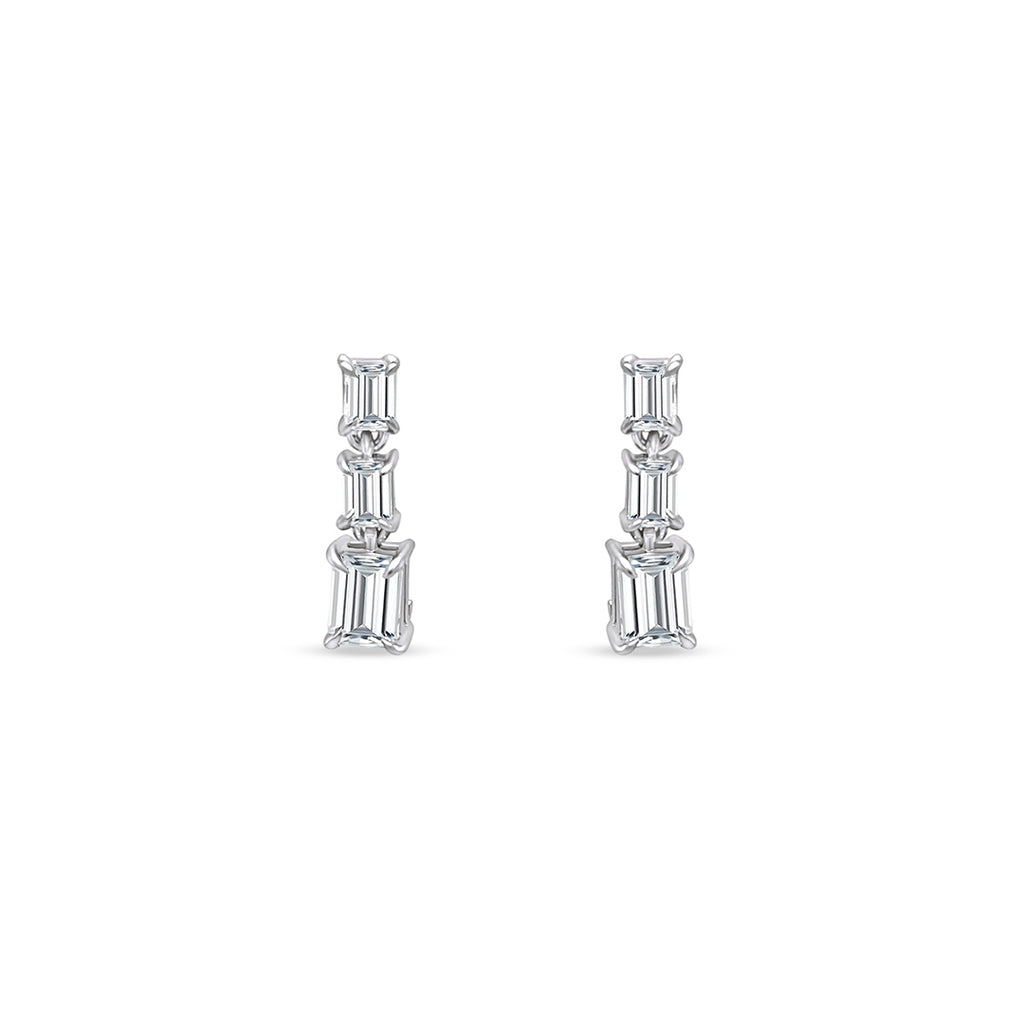  Emerald Cut Diamond Drop Earrings, sophisticated jewelry, elegant diamond earrings, sparkling gemstone drops, luxurious emerald-cut design, exquisite jewelry accessories, statement earrings, fine craftsmanship, glamorous diamond jewelry, radiant gemstone drops, timeless and refined style.