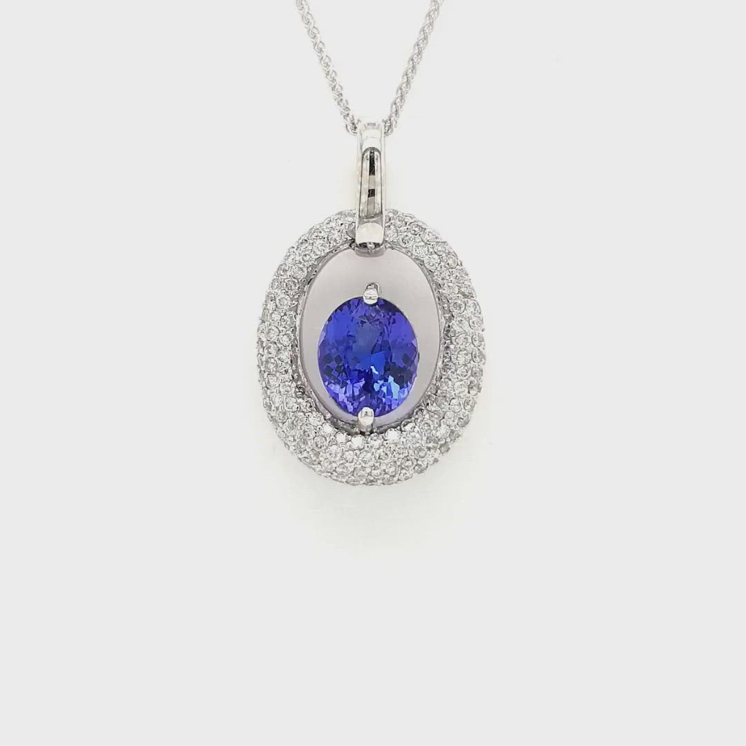 2.90ct Oval Tanzanite & Diamond Pendant Oval Tanzanite & Diamond Pendant, Elegant Gemstone Jewelry, Blue Violet Gemstone Necklace, Sparkling Diamond Accents, Sterling Silver Pendant, Statement Piece, Luxury Accessories, December Birthstone Gift, Fine Jewelry Collection, Exquisite Oval Cut Tanzanite Pendant, Radiant Gemstone Pendant, Timeless Elegance, Exceptional Craftsmanship.