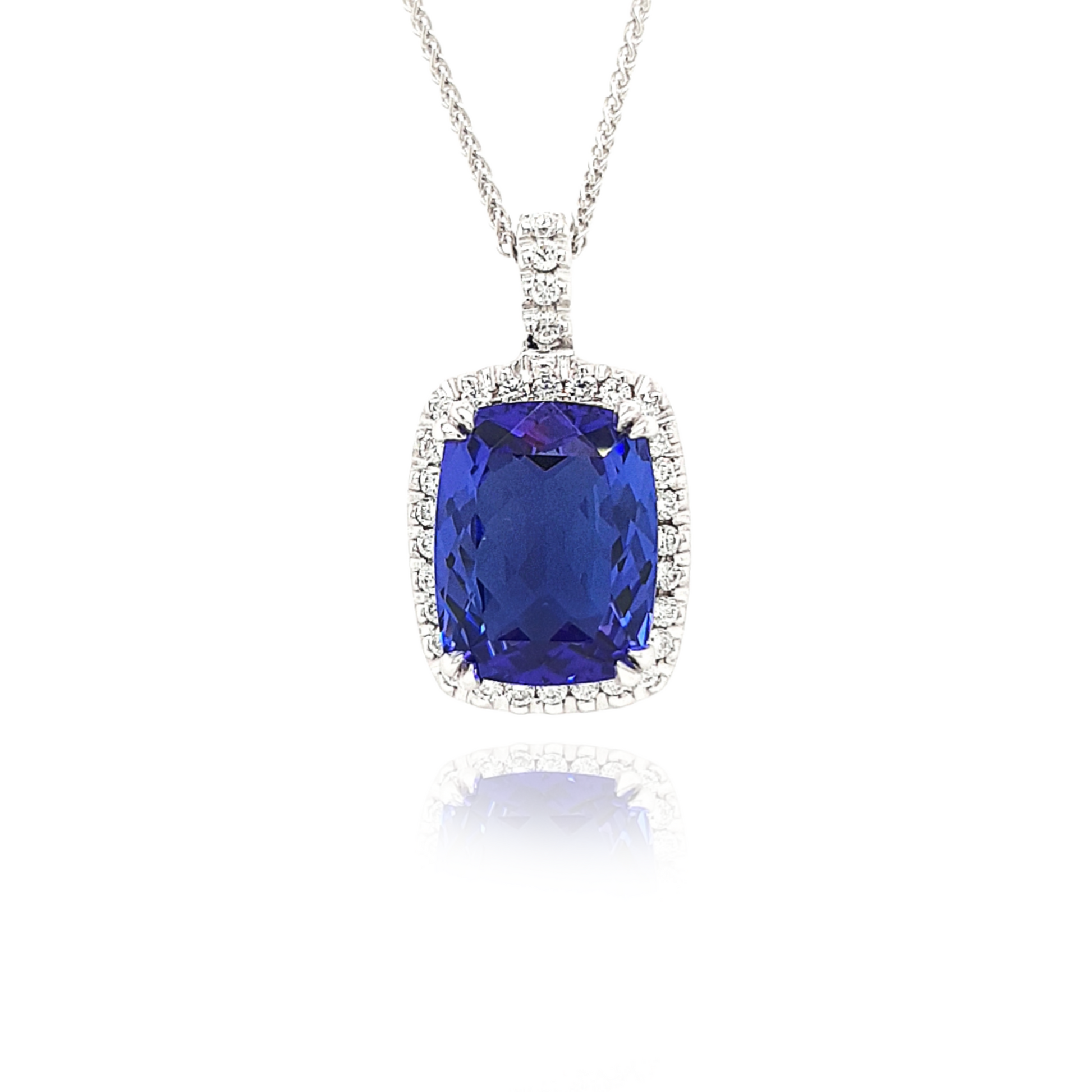 Cushion Cut Tanzanite Pendant, Diamond Halo Necklace, Gemstone Jewelry, Elegant Accessory, Blue Violet Gemstone, Sparkling Diamonds, Statement Necklace, Luxury Pendant, Fine Jewelry, Precious Stones, Glamorous Fashion, Exquisite Design, Radiant Gem, Anniversary Gift, Special Occasion Necklace, Timeless Elegance